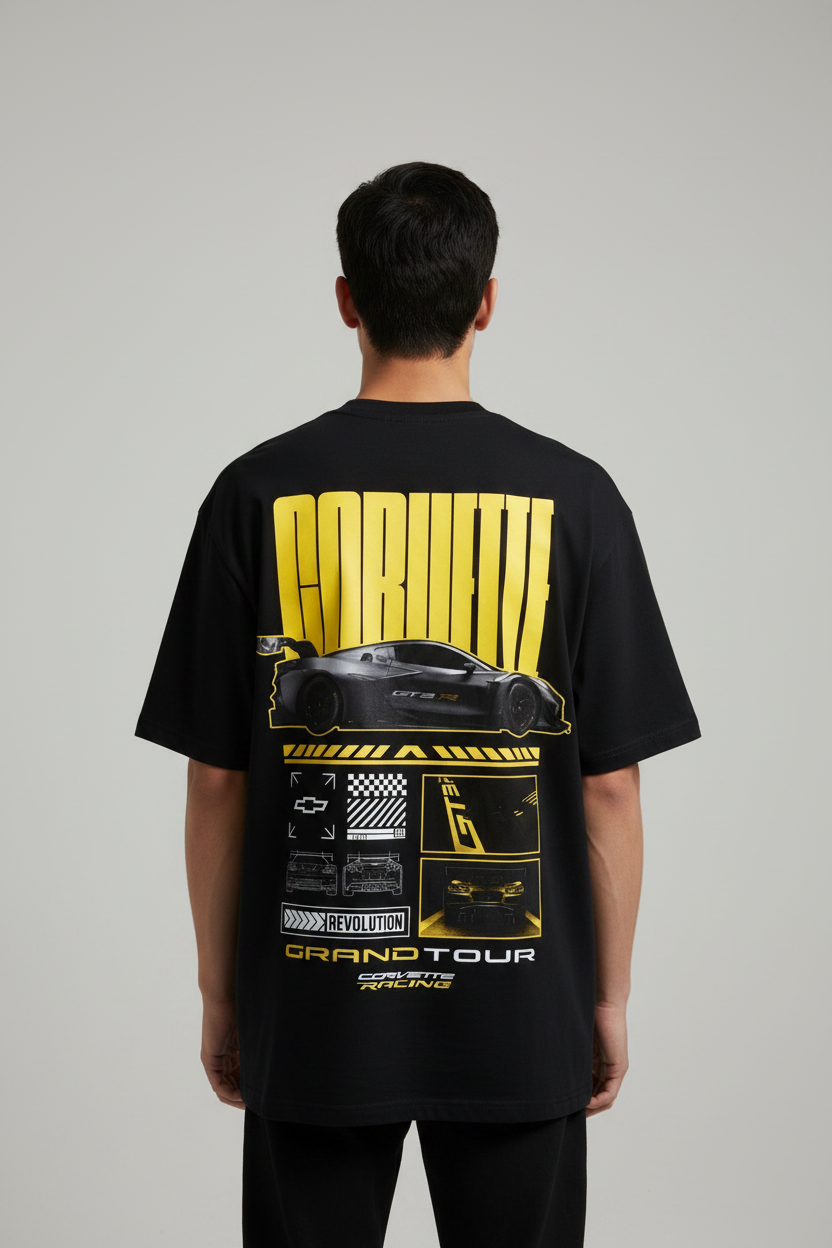 Black t-shirt with yellow and white graphics on a gray background