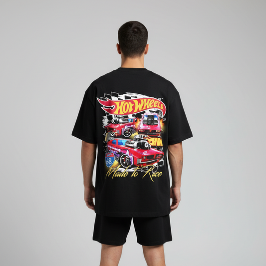 Black t-shirt with Hot Wheels graphic featuring cars and 'Made to Race' text on a gray background