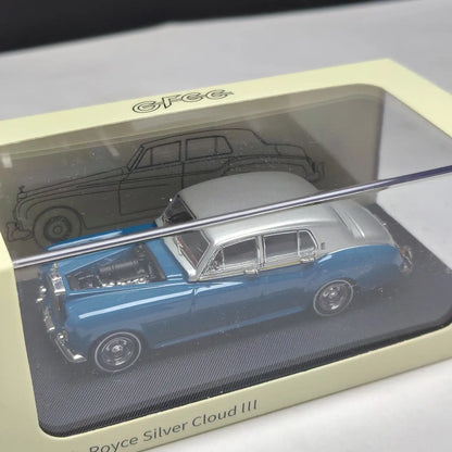 Model of a Royce Silver Cloud III in a display case with 'GFFC' branding.